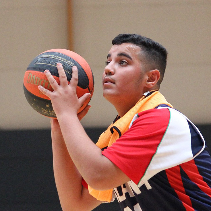 Delany Catholic College Granville student playing basketball