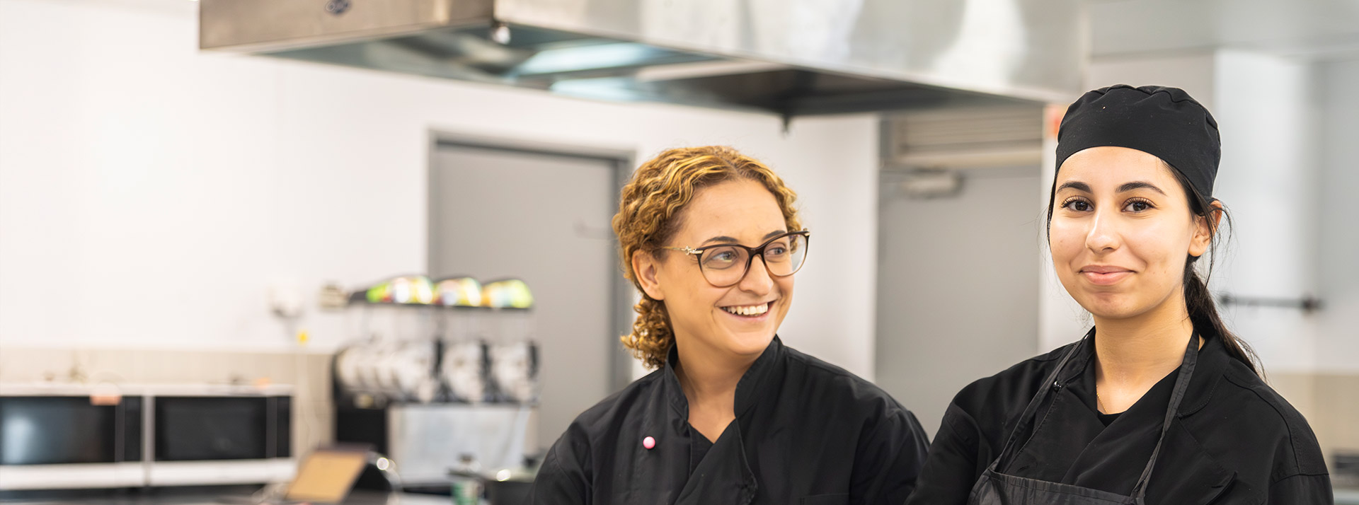 Delany Granville Food Tech Hospitality student and teacher in kitchen