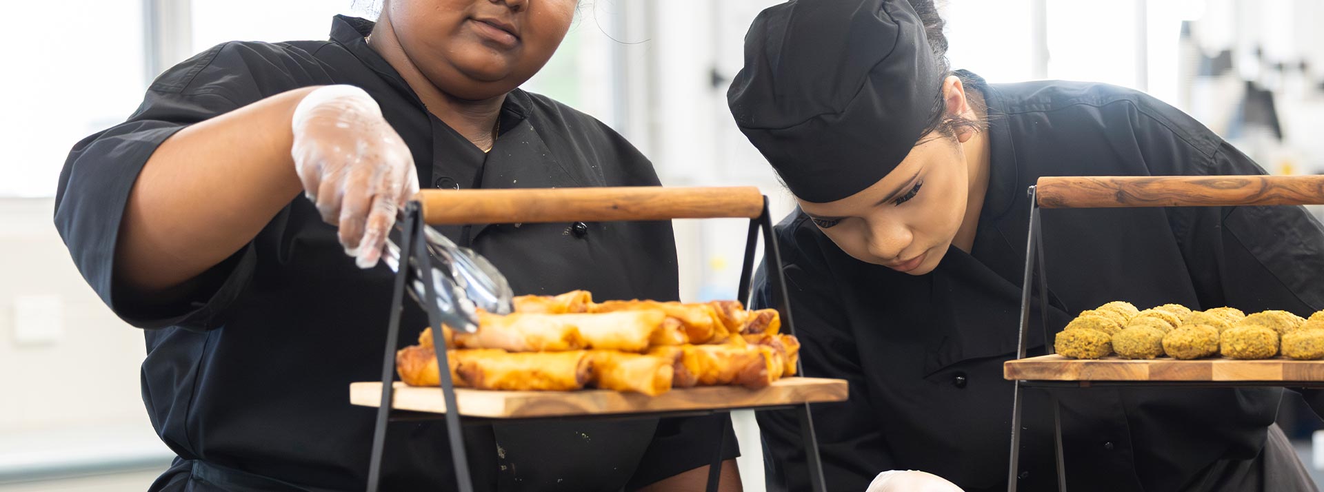 Hospitality Food Tech students preparing finger food