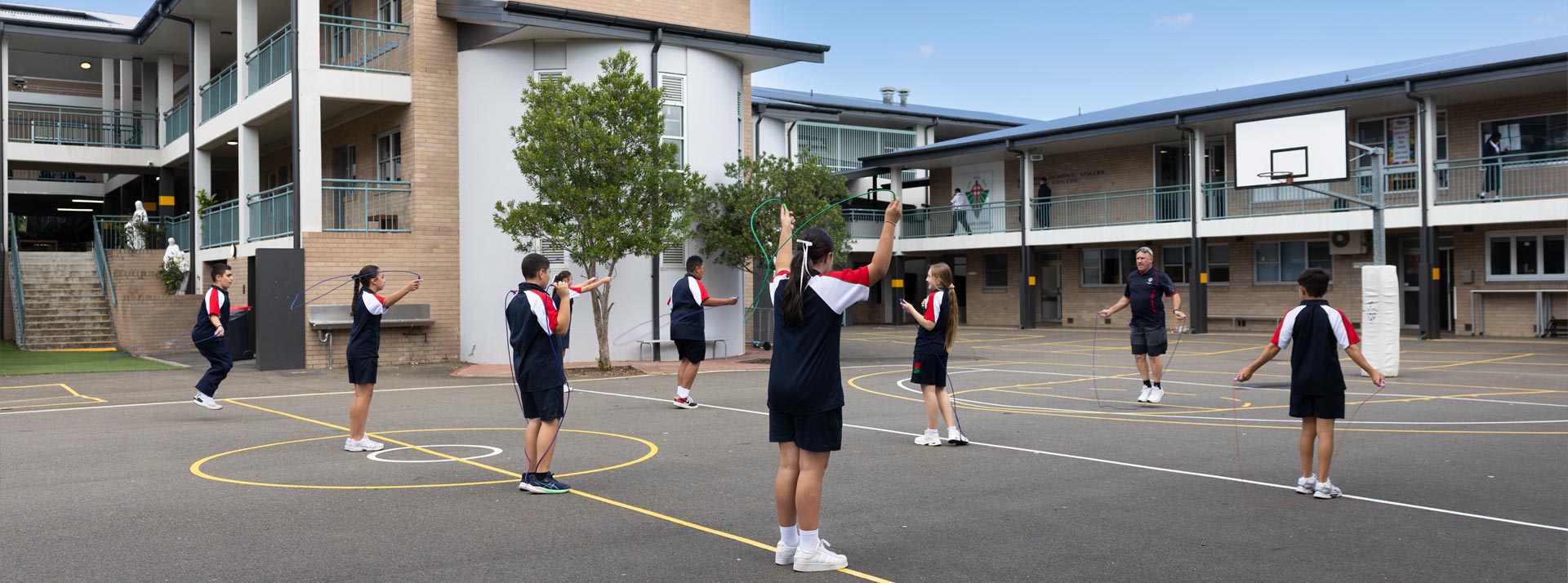 Delany Granville students playing skip rope outdoors