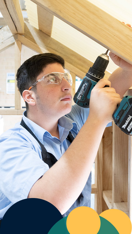 Delany Granville student in woodwork class