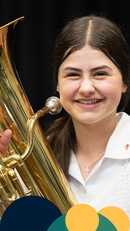 Delany Granville student playing brass instrument