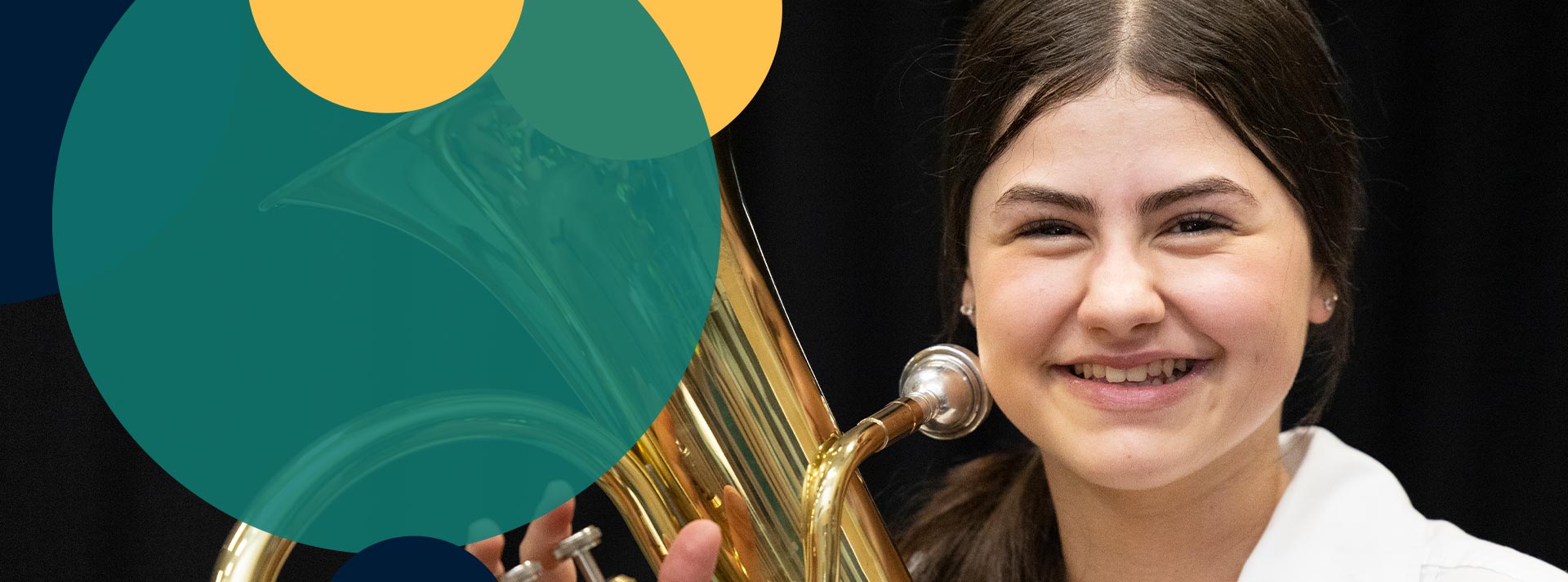 Delany Granville student playing brass instrument