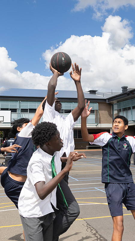 Delany College Granville students playing basketball