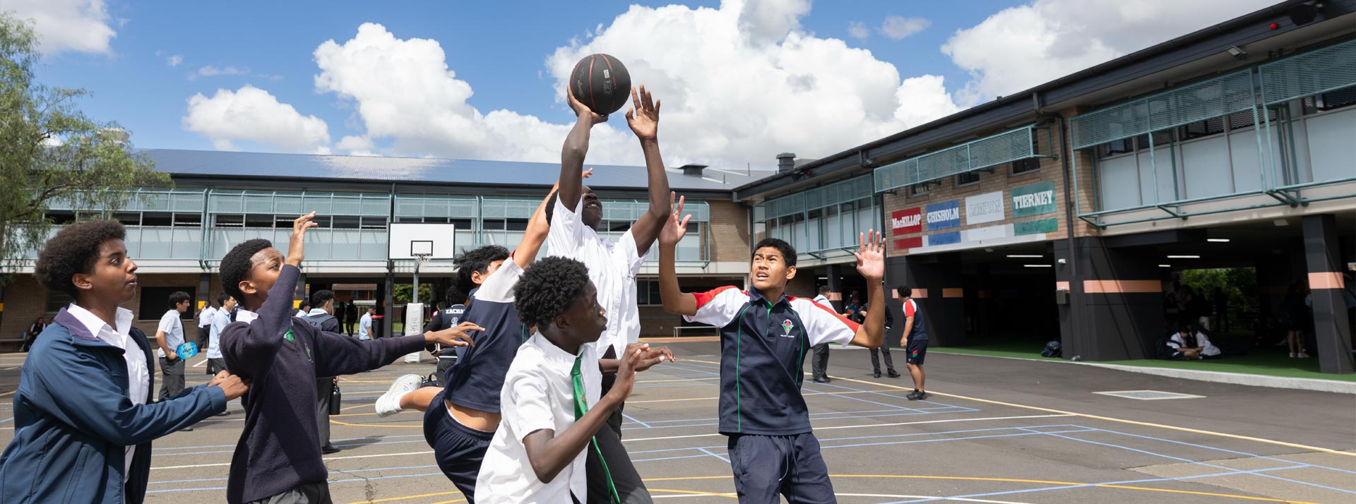 Delany College Granville students playing basketball