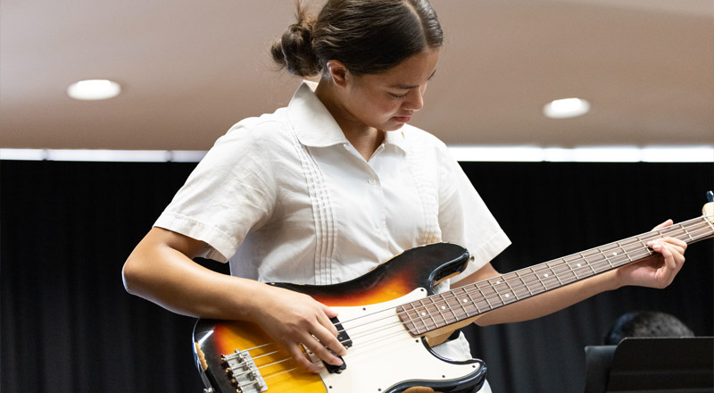 Delany College Granville Student playing bass