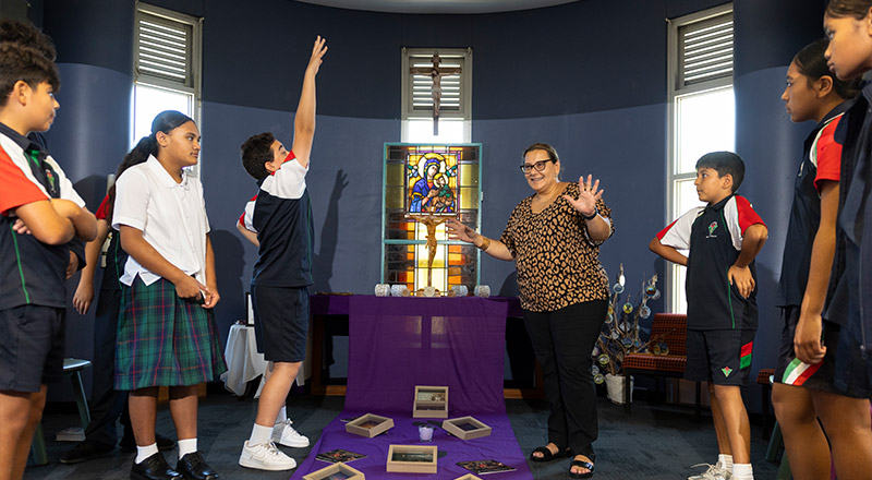 Religion teacher at Delany Granville addressing the class