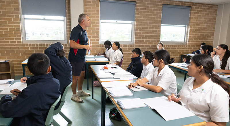 Delany Granville teacher walking through classroom