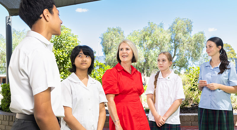 Shauna Nash, Principal of Delany Granville, and students