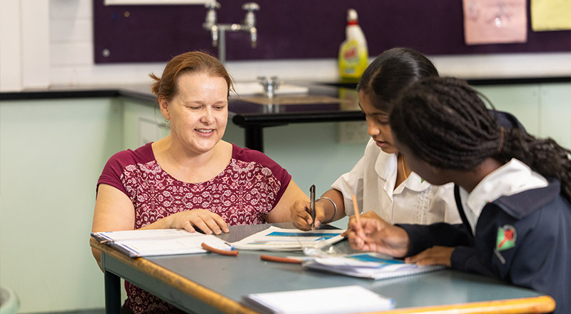 Teacher assisting Year 7 and 8 Students from Delany College Granville